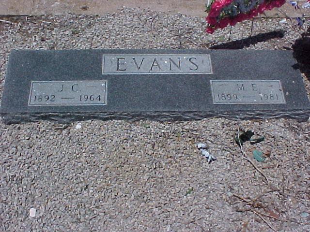 Tombstone of J. C. and M. E. Evans