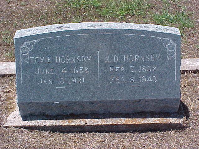 Tombstone of M. D. and Texie Hornsby