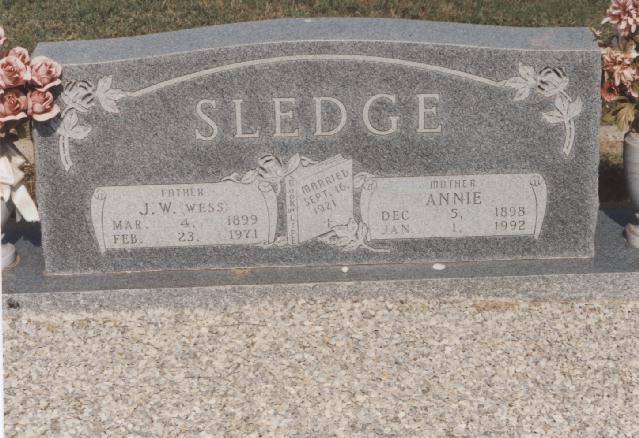 Tombstone of J. W. and Annie Sledge