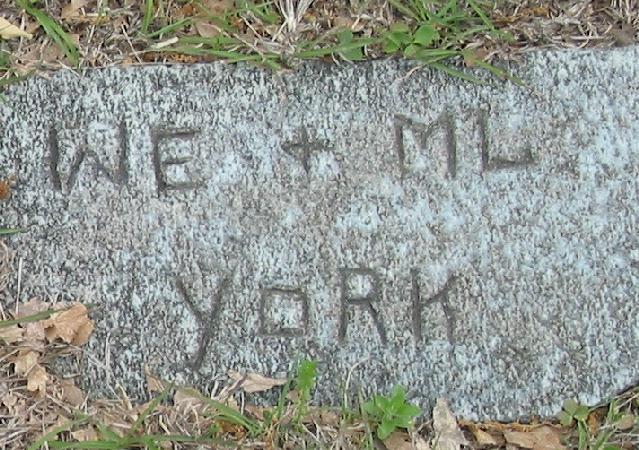 Tombstone of W. E. and M. L. York